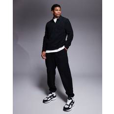 Clothing ASOS DESIGN Tapered Fleece Joggers - Black