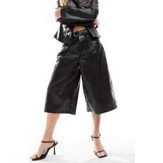 Bershka faux leather jorts in black