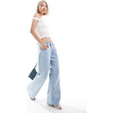 Motel roomy wide leg low rise jeans in light wash blue