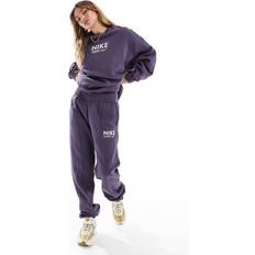 Purple - Women Trousers & Shorts Nike Swoosh fleece joggers in dark purple