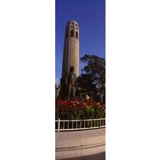 Posters Statue of Christopher Columbus in Front of A Tower Coit 18 x 6 Poster