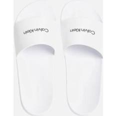 Calvin Klein Slides Calvin Klein Logo-Print Rubber Slides - White