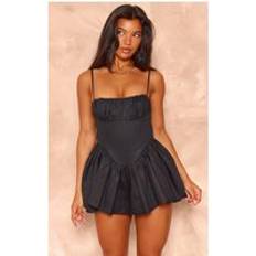 PrettyLittleThing Dipped Waist Strappy Romper - Black