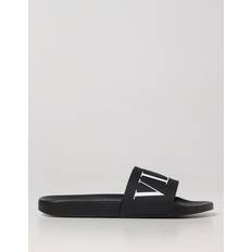 Valentino Garavani Slides Valentino Garavani Rubber Slides - Black