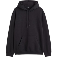 H&M Men Clothing H&M Loose Fit Hoodie - Black