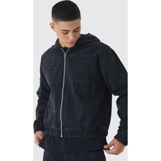 Denim Truien boohooMAN Kastiger Denim-Hoodie mit Kreuz-Applikation - Schwarz