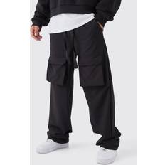 Baggy Hosen boohooMAN Lockere Nylon Cargo-Hose - Schwarz