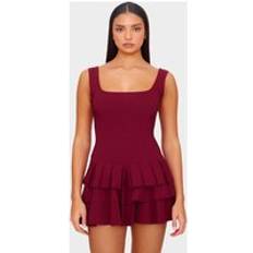 Jumpsuits - Red Jumpsuits & Overalls PrettyLittleThing Stretch Woven Pleated Skort Playsuit - Red