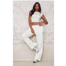 PrettyLittleThing Cream Contrast Embroidery Wide Leg Joggers - White