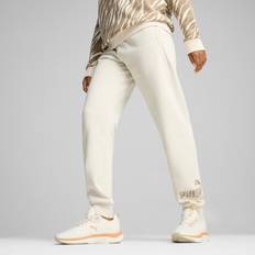 Multifärgade Byxor Puma Women's ESS+ Animal Pants - Alpine Snow