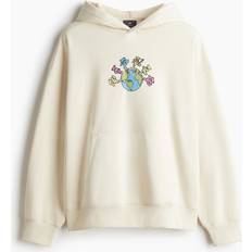 H&M Oversized Fit Hettegenser Med Trykk - Beige