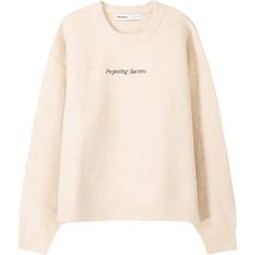 Bershka Beige Tröjor Bershka Gräddvit Stickad Tröja Med Broderi - Naturlig