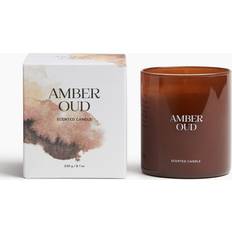 H&M i Glasbehållare Gul Brun Amber Oud Doftljus