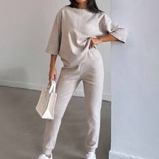 Adult Trousers on sale Shein Solid Drop Shoulder Top and Sweatpants