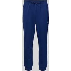 Blåa - Yoga Byxor adidas Essentials Feelcozy Fleece Pant - Dark Blue/White