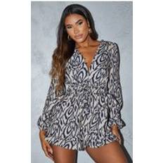 Faux Fur Jumpsuits & Overalls PrettyLittleThing Stone Tiger Print Button Detail Playsuit - White