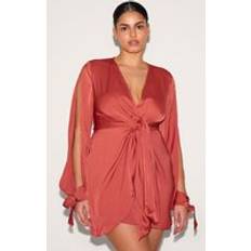 PrettyLittleThing Plus Rust Plunge Neck Satin Twist Front Open Sleeve Wrap Dress - Orange