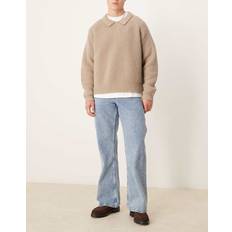 ASOS DESIGN Utsvängda Vida Jeans Med Tvättad Finish - Ljusblå