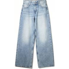 Bershka Superbaggy Jeans Med Vida Ben - Ljusblå