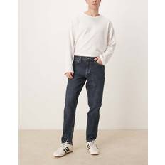 ASOS DESIGN Avsmalnande Jeans Med Stretch - Mörkblå