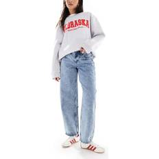 Low-Rise Light Wash Tapered Baggy Jeans - Light Blue