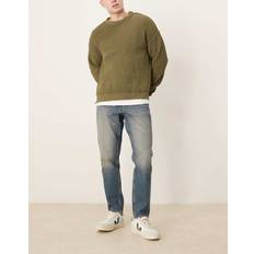 ASOS DESIGN Avsmalnande Jeans - Mellanblå