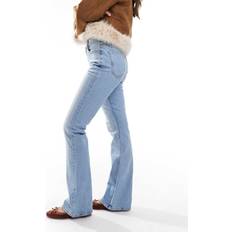 ASOS DESIGN Utsvängda Jeans Medelhög Midja - Ljusblå