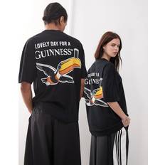 One Size T-shirts ASOS DESIGN T-shirt Unisex Modell Oversize Med Licenserat Guiness Tryck - Svart
