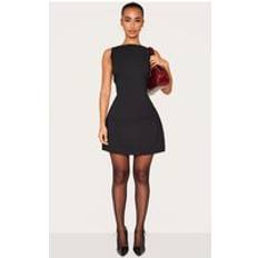 PrettyLittleThing Petite Woven Open Back Mini Dress - Black