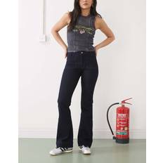 Wrangler Dam Jeans Wrangler Utsvängda Jeans Med Fickor - Mörkblå