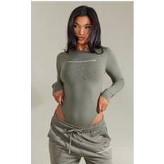 Green Shapewear & Under Garments PrettyLittleThing Khaki Logo Print Long Sleeve Bodysuit - Green