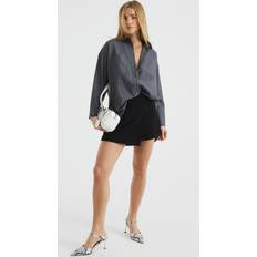 River Island Asymmetrisk Skort Med Forlomme Og Plisseringer - Sort