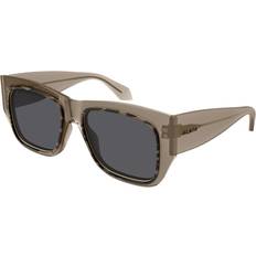 Solglasögon Azzedine Alaïa AA0090S 002 Men's Sunglasses - Transparent Pastel Brown Tortoise