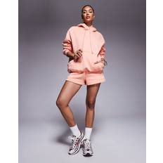 Nike phoenix hoodie Nike Phoenix Fleece Rosa Huvtröja
