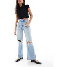 Tvättade Jeans Dad-Modell Med Vida Ben Och Knärevor - Ljusblå