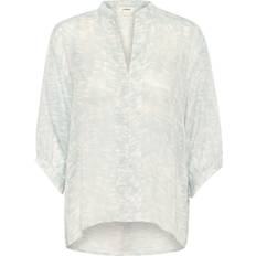 Soaked in Luxury V-Neck Sheer Blouse - Blue