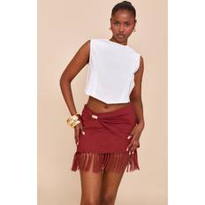 Gold Skirts PrettyLittleThing Gold Trim Tassle Hem Mini Skirt - Orange