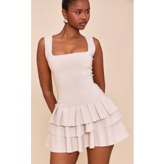PrettyLittleThing Stretch Woven Pleated Skort Playsuit - Brown