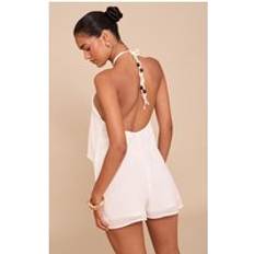 PrettyLittleThing Backless Bead Detail Floaty Playsuit - White