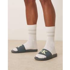 Calvin Klein Slippers & Sandals Calvin Klein Logo Sliders