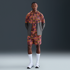 Nike Orange Byxor & Shorts Nike Challenger - Grå