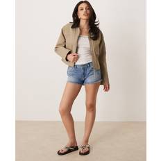 Low Waist Shorts Gina Tricot Raw Hem Distressed Look Denim Shorts - Midwash Blue