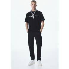 Oberteile H&M Bedrucktes T-Shirt in Loose Fit - Schwarz/New York