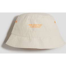 Sonnenhüte H&M Bucket Hat Jump Play - Hellbeige