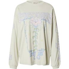 Monki Oversized Long Sleeve T-Shirt with Spirit Keeper - Light Green