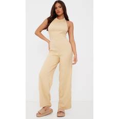 PrettyLittleThing Textured Halterneck Low Back Jumpsuit - Camel