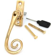 Window Handles From The Anvil Polished Brass Slim Monkeytail Espag