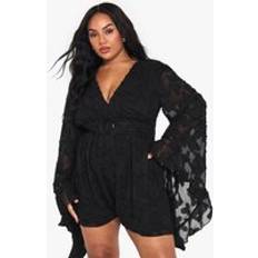 Flare Jumpsuits & Overalls boohoo Womens Plus Textured Flare Sleeve Playsuit - Black