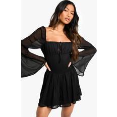 Short Sleeves Jumpsuits & Overalls boohoo Womens Chiffon Shirred Chiffon Playsuit - Black