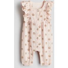 H&M Playsuits H&M Baby Heldragt Musselin Med Flæser - Ferskenrosa/Blomstret